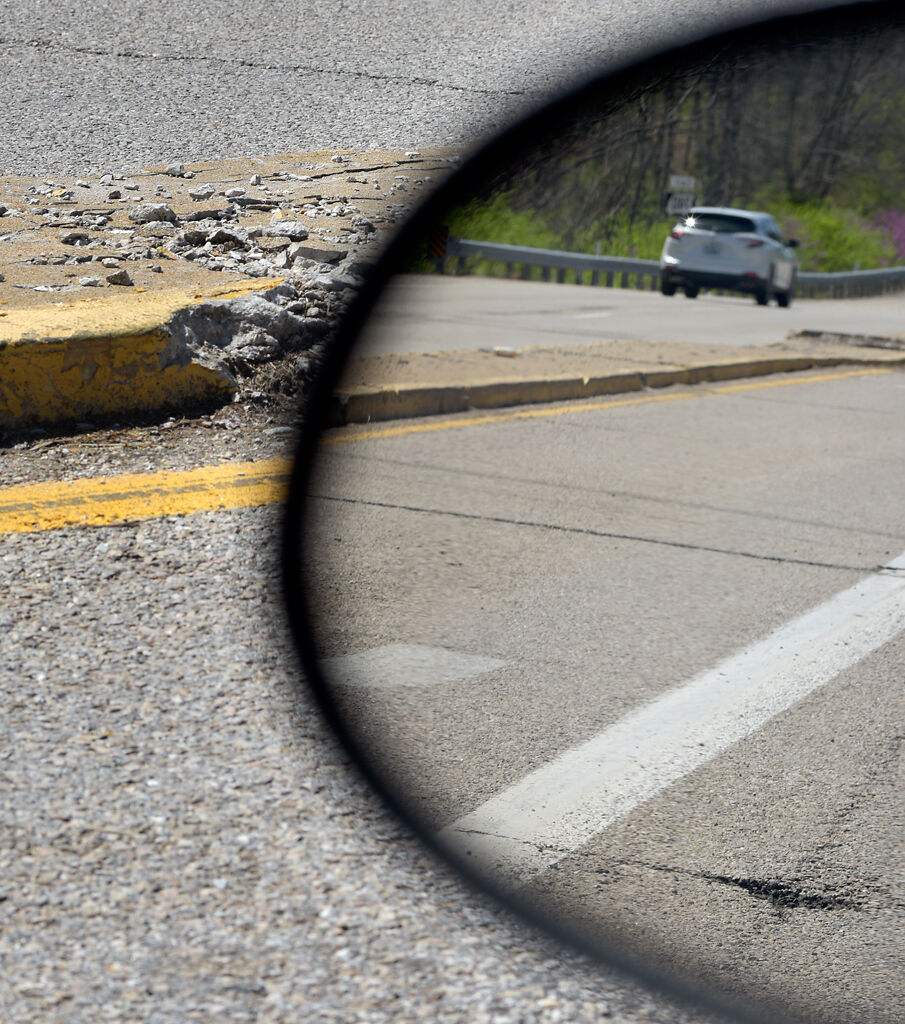 Potholes are scattered across Stadium Blvd